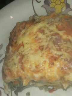 Una foto de Lasagna de carne, jamón, queso y verdura