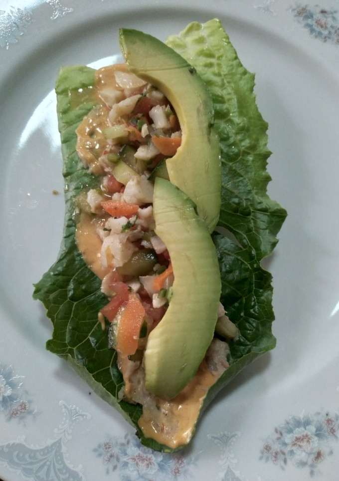 Una foto de Tacos de lechuga con pescado