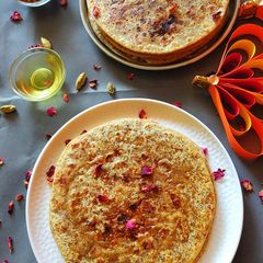 A picture of Shenga Holige (groundnut stuffed sweet Paratha).