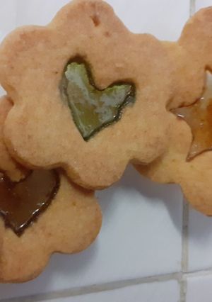A picture of Edible Christmas tree décor; stained glass windows biscuits.