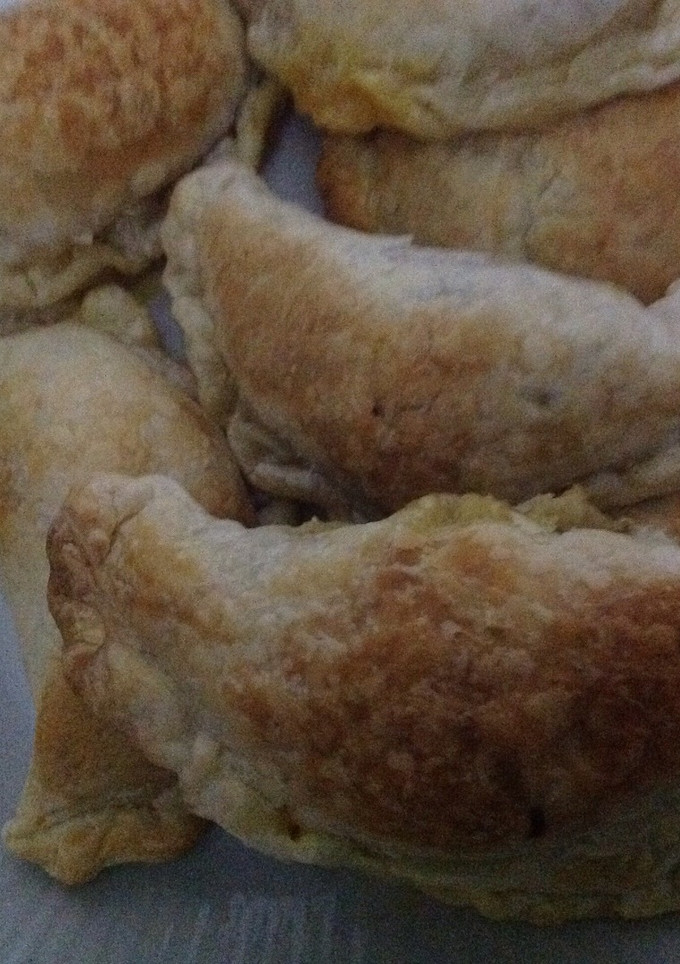Una foto de Empanadas de Cebolla y Queso con Palillos