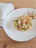 Bulgur con pollo, verdure e arachidi