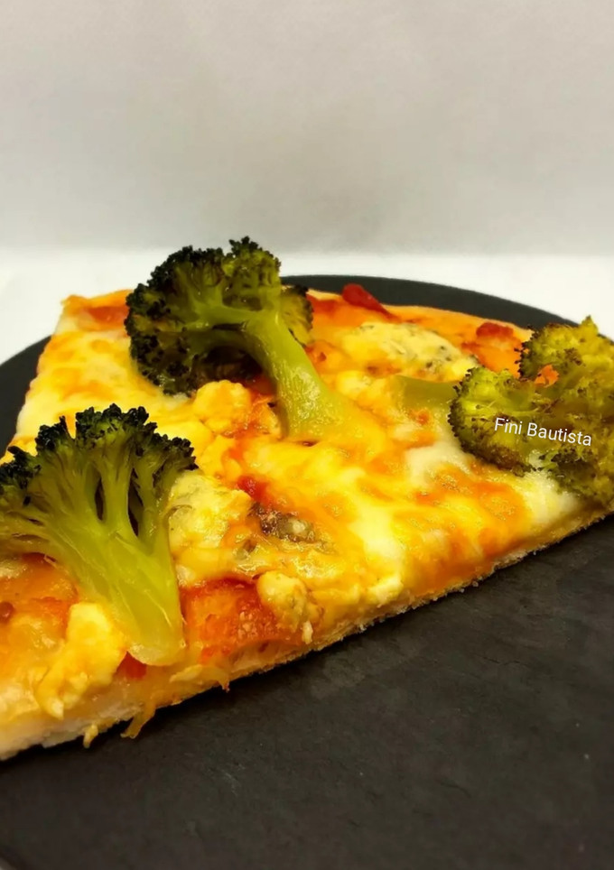 Una foto de Pizza casera de brócoli