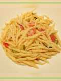 Trofie pasta with fresh tomatoes and courgette