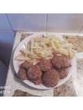Churrascos de lenguas al horno con papas fritas