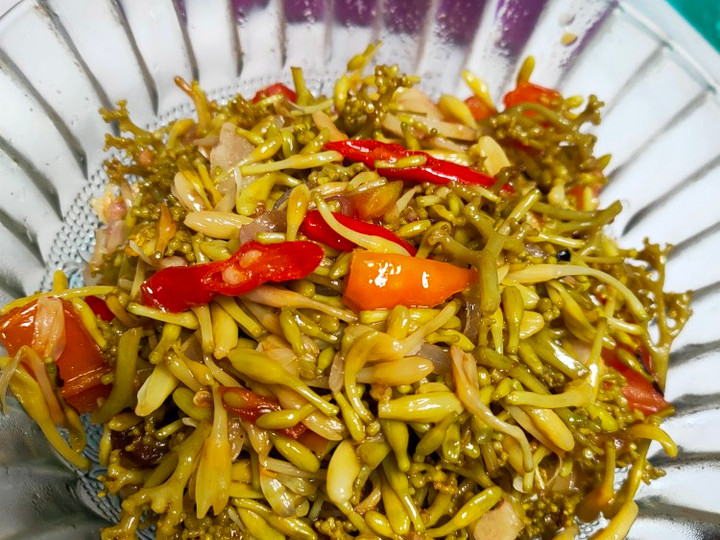 Bagaimana Membuat Tumis kembang pepaya yang Menggugah Selera