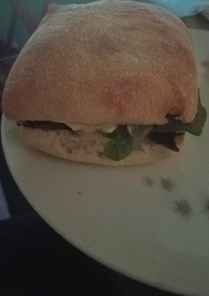 A picture of Veggie Sandwich with basil mayo.