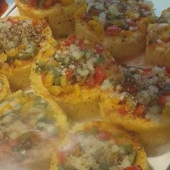A picture of Dhokla cheese chaat.