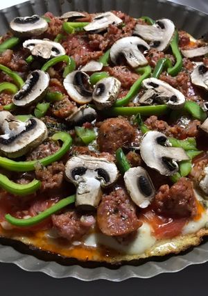 Una foto de Pizza low carbo masa de coliflor