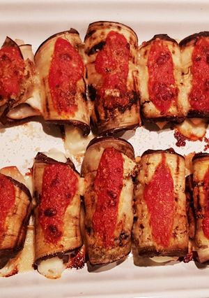A picture of Eggplant rolls filled with ham & cheese.