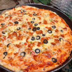Chicken tikkka pizza A picture of Chicken tikkka pizza.