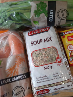 A picture of Soup with beef bones and soup mix.
