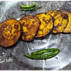 A picture of Begun Bhaja (Brinjal Tawa Fry).