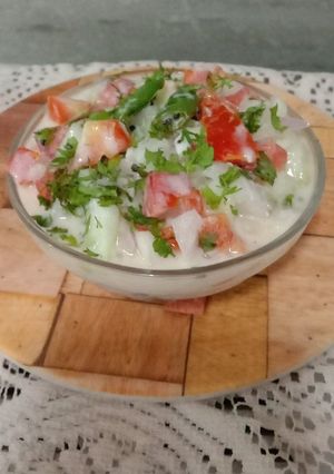A picture of Kakdi, tomato onion raita.
