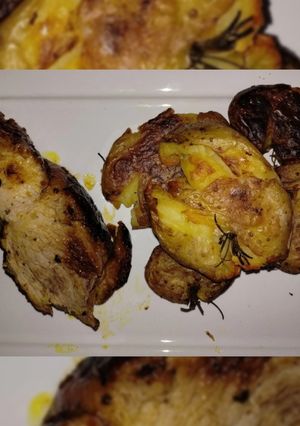 Una foto de Asado de cerdo al horno con papas explotadas