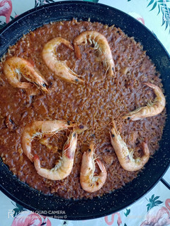 Una foto de Arroz con langostinos