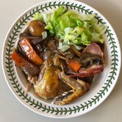 A picture of Guinea Fowl with Roasted Vegetables.