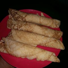 A picture of Pancakes with Fried Egg Filling.