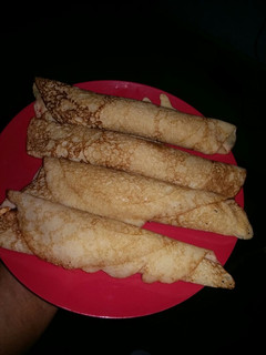 A picture of Pancakes with Fried Egg Filling.