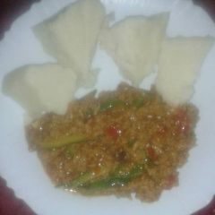 A picture of Pan fried mince sossi soya served with ugali.
