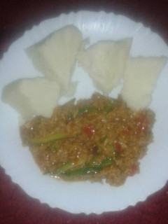 A picture of Pan fried mince sossi soya served with ugali.