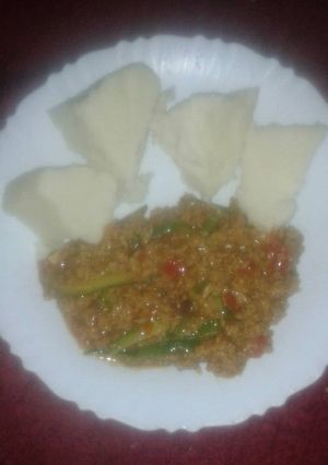 A picture of Pan fried mince sossi soya served with ugali.