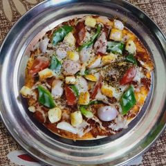 A picture of Homemade 🍕 pizza.