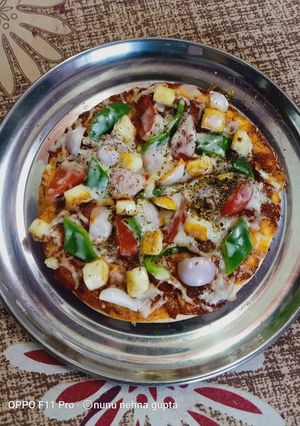 A picture of Homemade 🍕 pizza.