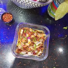 A picture of Loaded Pizza fries.