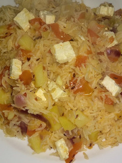 A picture of Aalu paneer rice.