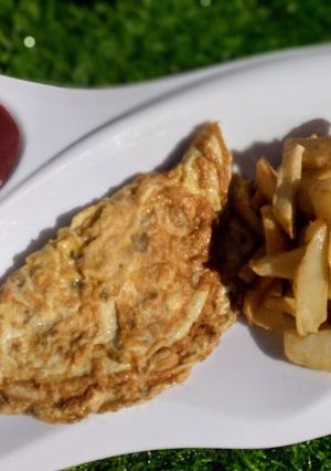 A picture of Chips & egg.