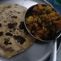 A picture of Dry aloo matar.