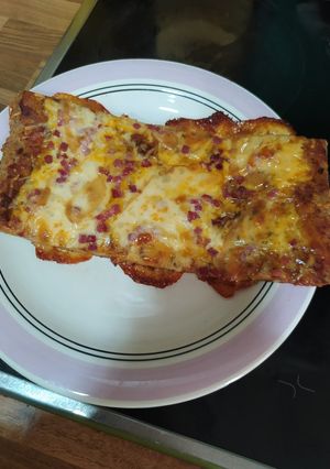 Una foto de Pizza con base de pollo