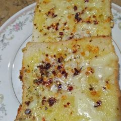 A picture of Cheesy garlic bread.