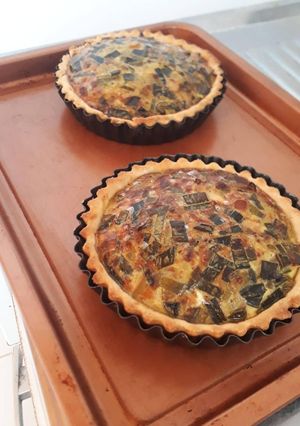 Una foto de Tartitas de puerro y panceta