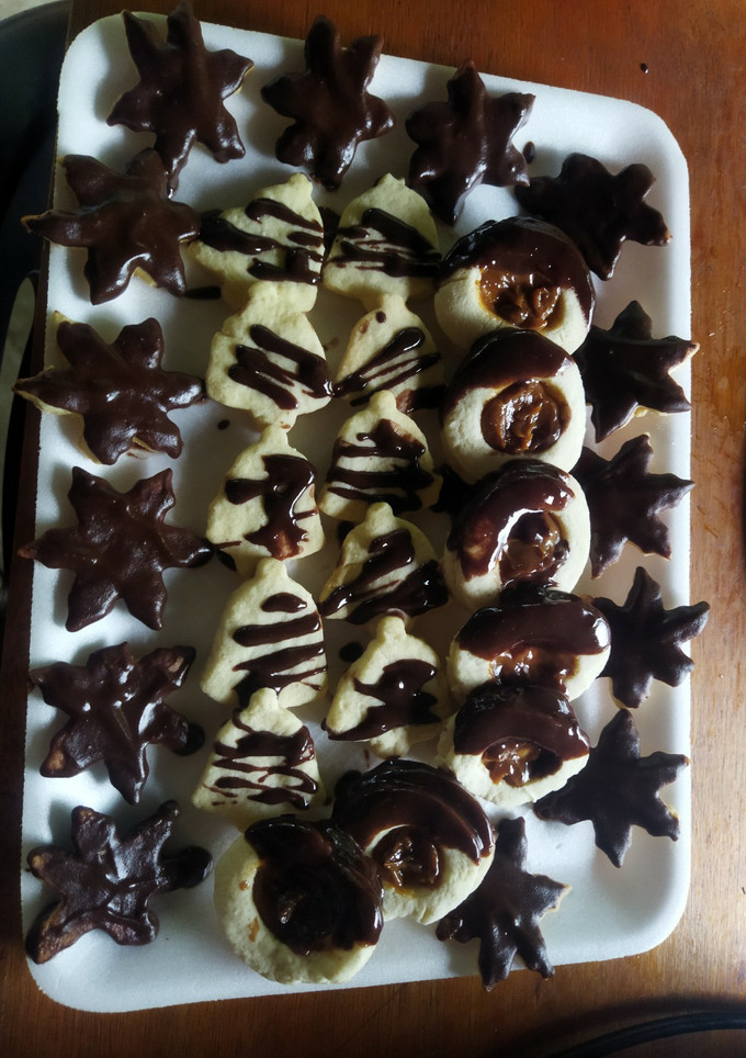 Una foto de Galletitas de vainilla con recubierto de chocolate 🍫