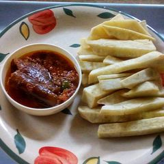 A picture of Yam Fingers and Ponmo Sauce.
