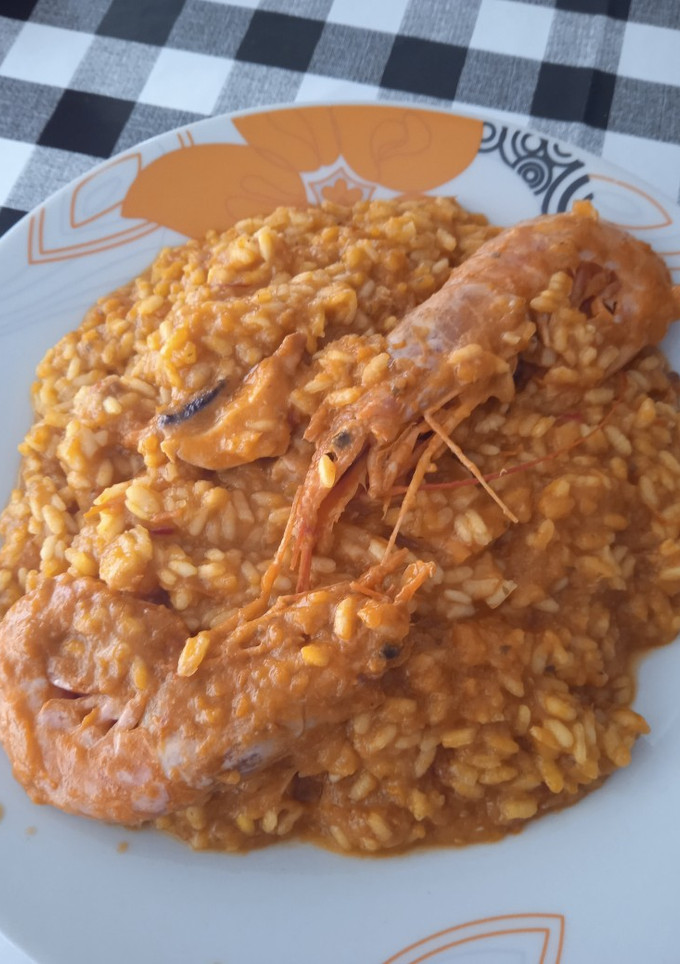 Una foto de Arroz meloso con pulpo, langostinos y gambones
