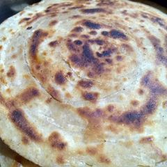 A picture of Laccha Parathe.