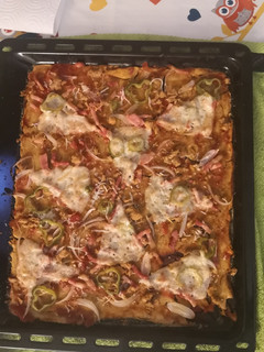 Una foto de Pizza con masa de harina de garbanzo