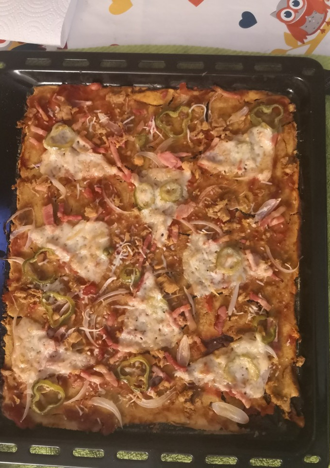 Una foto de Pizza con masa de harina de garbanzo