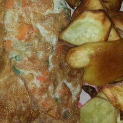 A picture of Sweet potatoes and fried egg.