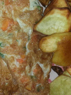 A picture of Sweet potatoes and fried egg.