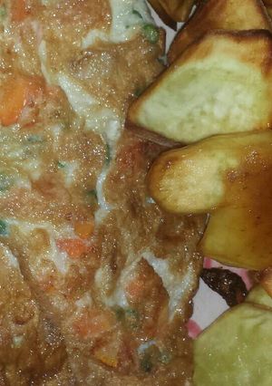 A picture of Sweet potatoes and fried egg.