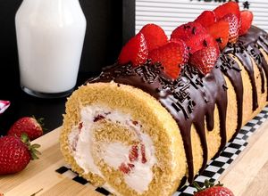 Una foto de Brazo de reina de fresas y chocolate