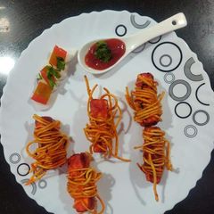 A picture of Paneer thread roll.