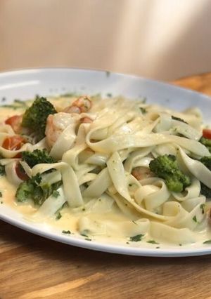 Una foto de Tagliatelli del mar a la tierra