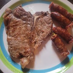 A picture of Entree Reservations (T-Bone Steak and Jalepeno Cheese Sausage).