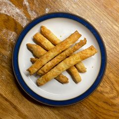 A picture of Cheese straws from excess pastry.