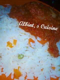 A picture of Coconut rice and stew.